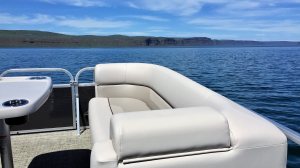 a boat parked next to a body of water