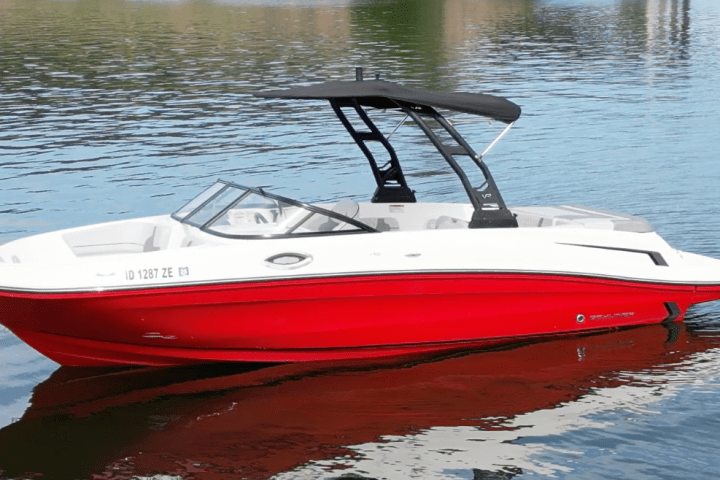a small boat in a body of water